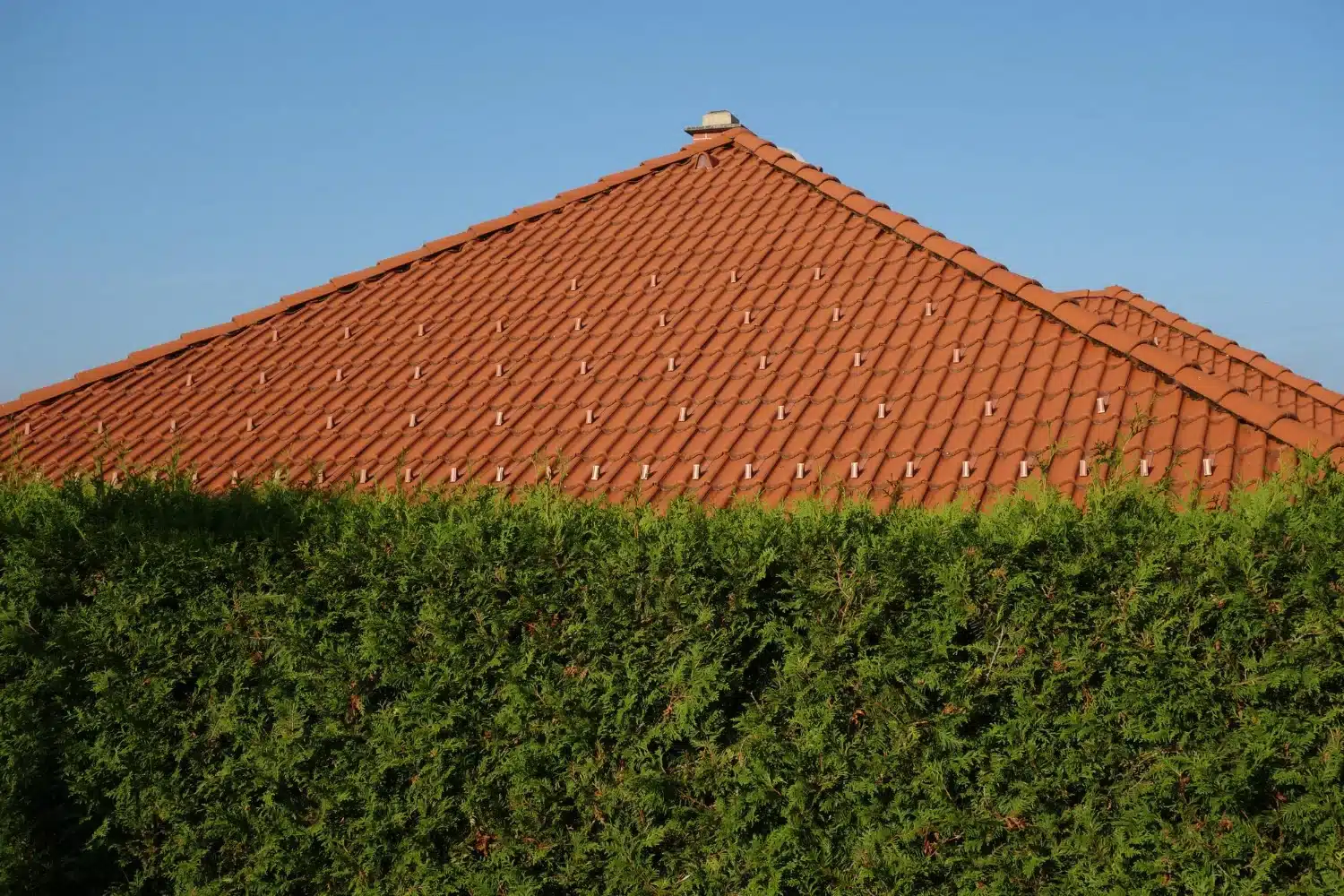 Couverture en ardoise et cheminées, toiture à chiffrer selon sa superficie